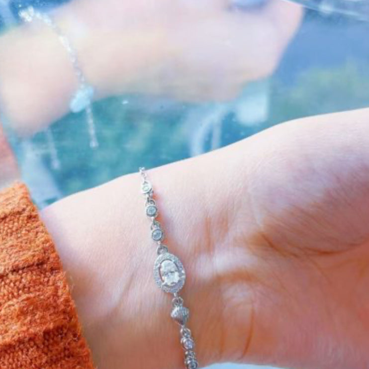Hot-Selling S925 Sterling Silver 6*4 Egg Shape + Shell Bracelet Fashionable Seven Stone Round Bag Diamond Mossanite
